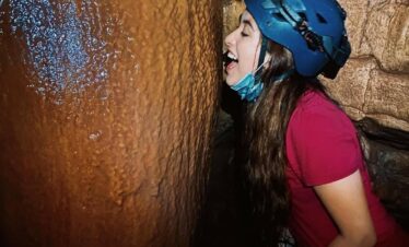 Woman with rock formation in Cavernas del Venado