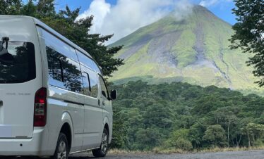 Shuttle service in front of Arenal Volcano in La Fortuna